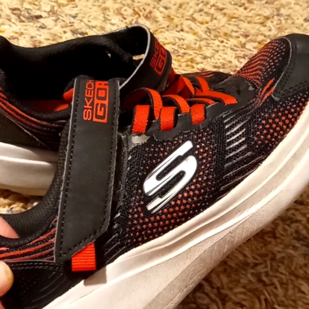 Sketchers black and red shoes